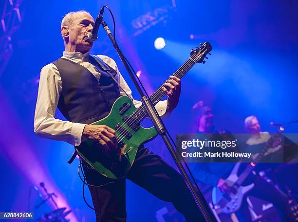 Francis Rossi,John Edwards,Andy Brown of Status Quo performing on stage at BIC on December 9, 2016 in Bournemouth, England.