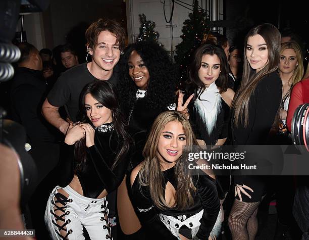 Charlie Puth poses with Camila Cabello, Normani Kordei, Ally Brooke, Lauren Jauregui of Fifth Harmony and Hailee Steinfeld at the Z100's Jingle Ball...