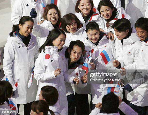 Russia - Japanese figure skaters - Mao Asada, Akiko Suzuki, Daisuke Takahashi, Kanako Murakami and Tatsuki Machida - snap a commemorative photo...