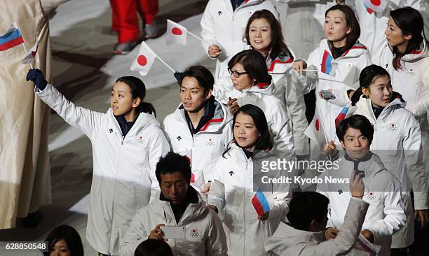 Russia - Japanese figure skaters - Mao Asada, Daisuke Takahashi, Akiko Suzuki, Tatsuki Machida and Kanako Murakami - march during the closing...