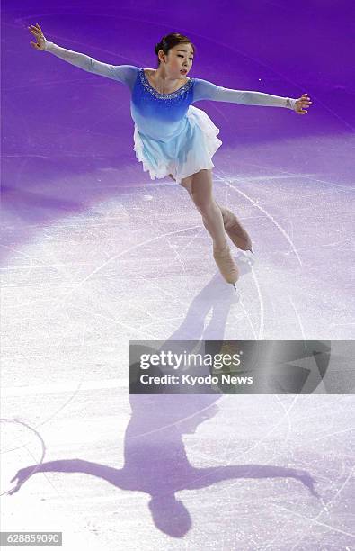 Russia - South Korean figure skater Kim Yu Na, silver medalist in the women's singles competition at the Sochi Winter Olympics, glides on the ice...