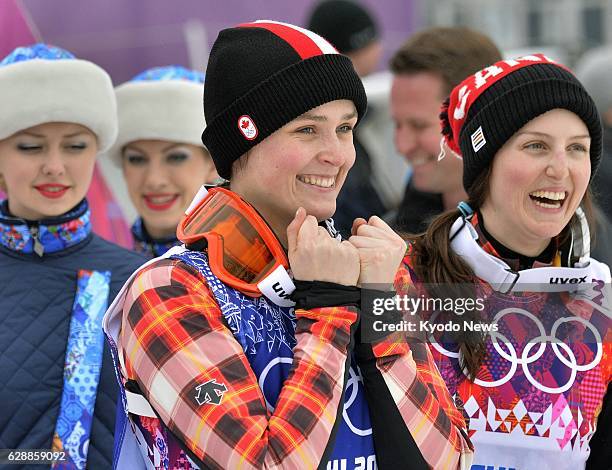 Russia - Canadian freestyle skier Marielle Thompson smiles after winning the women's ski cross competition at the Sochi Olympics in Russia on Feb....