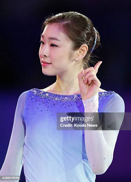 Russia - South Korean figure skater Kim Yu Na, the silver medalist in the women's singles competition at the Sochi Olympics, performs to "Imagine"...