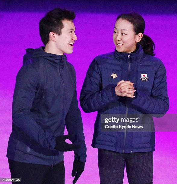 Russia - Mao Asada of Japan and Patrick Chan of Canada chat during rehearsal for a Winter Olympics figure skating gala exhibition at the Iceberg...