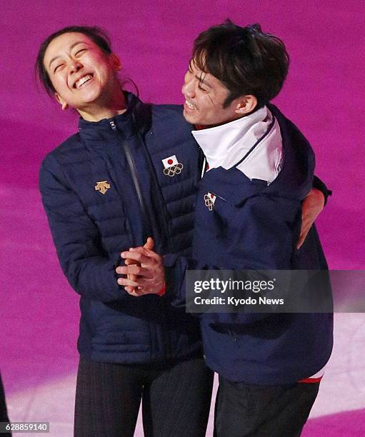 Russia - Japanese figure skaters Mao Asada and Daisuke Takahashi are all smiles as they rehearse for a gala exhibition at the Iceberg Skating Palace...