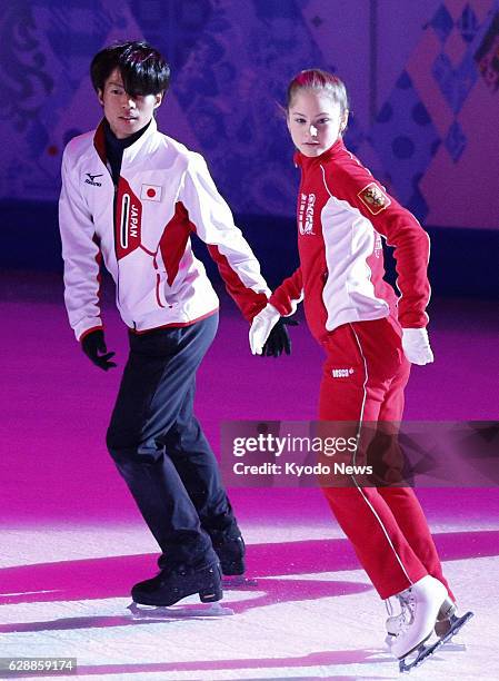 Russia - Tatsuki Machida of Japan practices with Julia Lipnitskaia of Russia for the figure skating exhibition on Feb. 22 at the Sochi Winter...