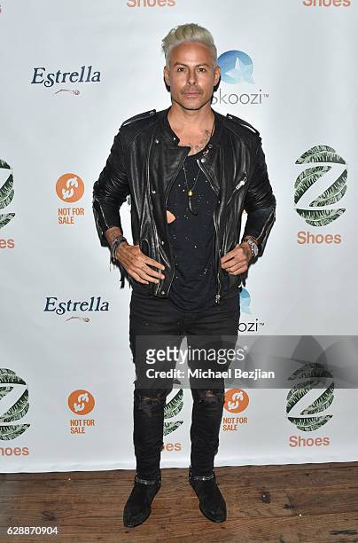 Artist Louis Carreon arrives at Not For Sale x Z Shoes Benefit at Estrella Sunset on December 9, 2016 in West Hollywood, California.