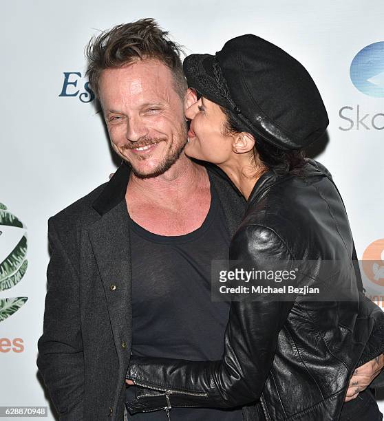 Actor Randall Slavin and Anaka Lee arrive at Not For Sale x Z Shoes Benefit at Estrella Sunset on December 9, 2016 in West Hollywood, California.