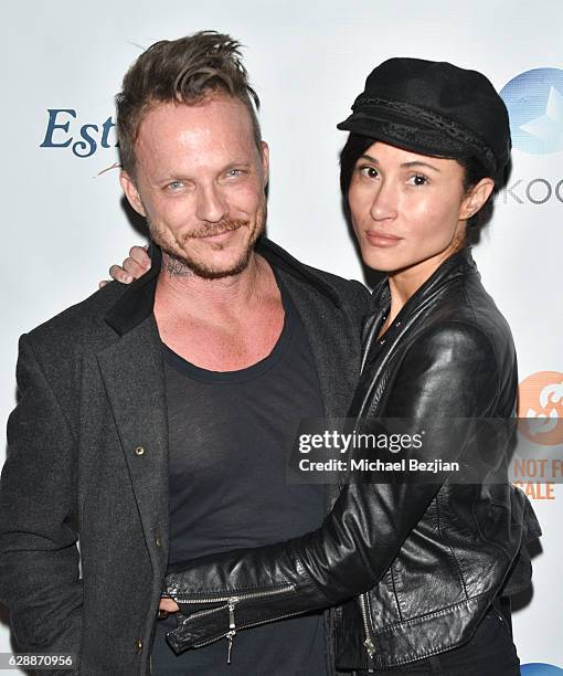 Actor Randall Slavin and Anaka Lee arrive at Not For Sale x Z Shoes Benefit at Estrella Sunset on December 9, 2016 in West Hollywood, California.