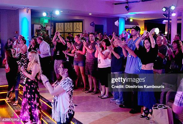 Guests enjoy a performance by Eli Young Band during CMT Story Behind The Songs LIV + Weekend at Sandals Royal Bahamian Spa Resort & Offshore Island -...