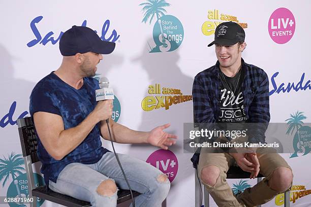 Host Cody Alan interviews recording artist Tucker Beathard during CMT Story Behind The Songs LIV + Weekend at Sandals Royal Bahamian Spa Resort &...