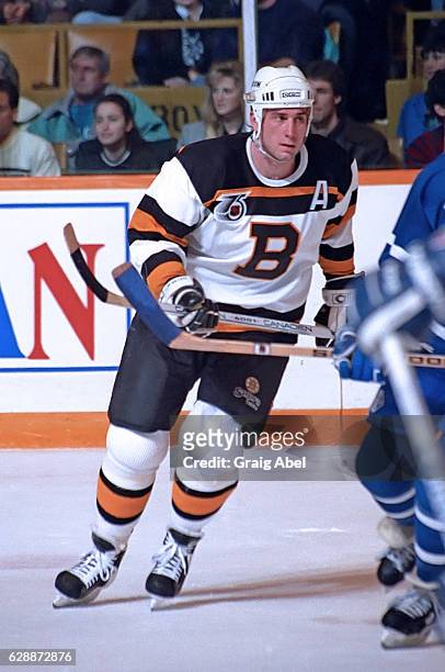 Cam Neely of the Boston Bruins turns up ice against the Toronto Maple Leafs during game action on January 22, 1992 at Maple Leaf Gardens in Toronto,...