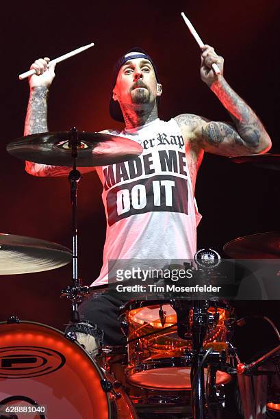 Travis Barker of Blink 182 performs during Live 105's Not So Silent Night at ORACLE Arena on December 9, 2016 in Oakland, California.