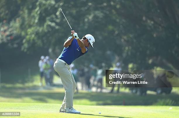 Rafa Cabrera Bello of SPain plays his third shot into the first green during the third round of the UBS Hong Kong Open at The Hong Kong Golf Club on...
