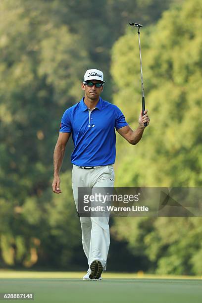 Rafa Cabrera Bello of Spain makes a birdie putt on the 15th green during the third round of the UBS Hong Kong Open at The Hong Kong Golf Club on...