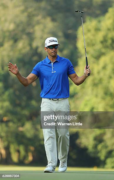 Rafa Cabrera Bello of Spain makes a birdie putt on the 15th green during the third round of the UBS Hong Kong Open at The Hong Kong Golf Club on...