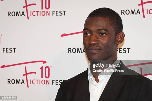 Malachi Kirby walking the red carpet of "Roots" during the 2nd day of Roma Fiction Fest.