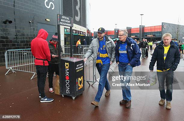 Wimbledon fans walk outside the stadium prior to the Sky Bet League One match between Milton Keynes Dons and AFC Wimbledon at StadiumMK on December...