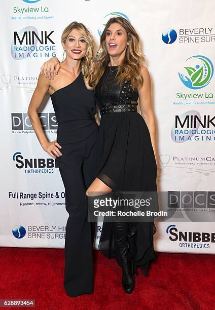 Gym Owners of SkyViewLA Maddalena Corvaglia and Elisabetta Canalis pose on the red carpet at Elisabetta and Maddalena For SkyViewLA on December 9,...