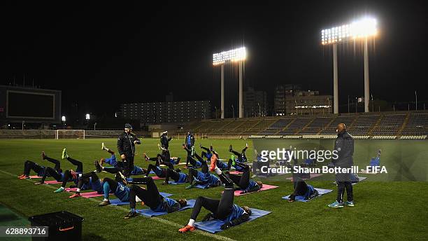 The players of Mamelodi Sundowns warm up before a training session at Nagai Ball Game Field on December 10, 2016 in Osaka, Japan.