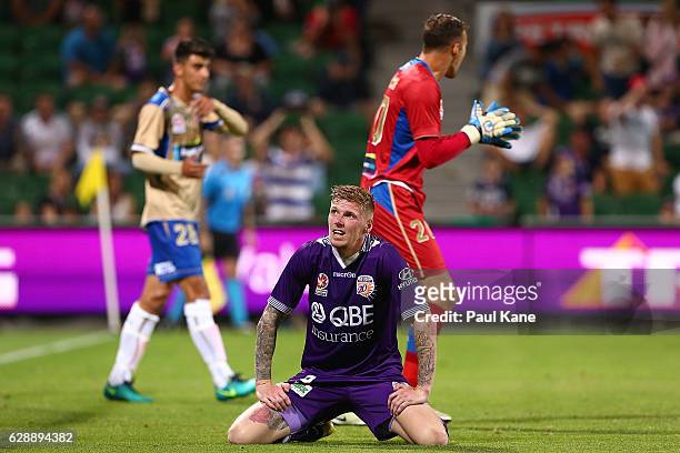 Andy Keogh of the Glory looks on after a missed shot on goal during the round 10 A-League match between the Perth Glory and the Newcastle Jets at nib...