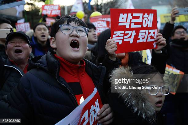 Protesters gathered and occupy major streets in the city center for a rally against South Korean President Park Geun-Hye on December 10, 2016 in...