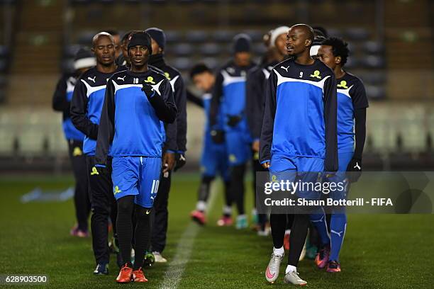 Teko Modise and Tebogo Langerman of Mamelodi Sundowns warm up during a training session at Nagai Ball Game Field on December 10, 2016 in Osaka, Japan.