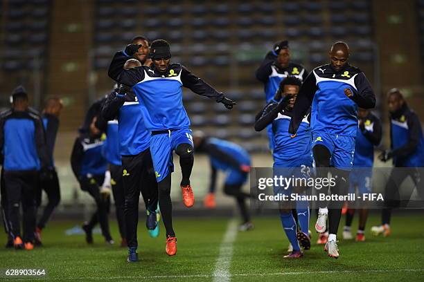 Teko Modise and Tebogo Langerman of Mamelodi Sundowns warm up during a training session at Nagai Ball Game Field on December 10, 2016 in Osaka, Japan.