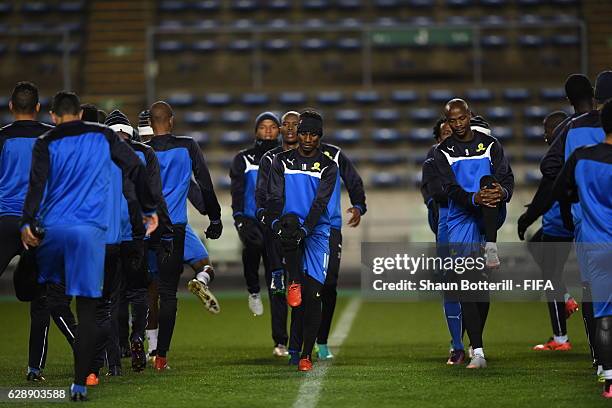 Teko Modise and Tebogo Langerman of Mamelodi Sundowns warm up during a training session at Nagai Ball Game Field on December 10, 2016 in Osaka, Japan.