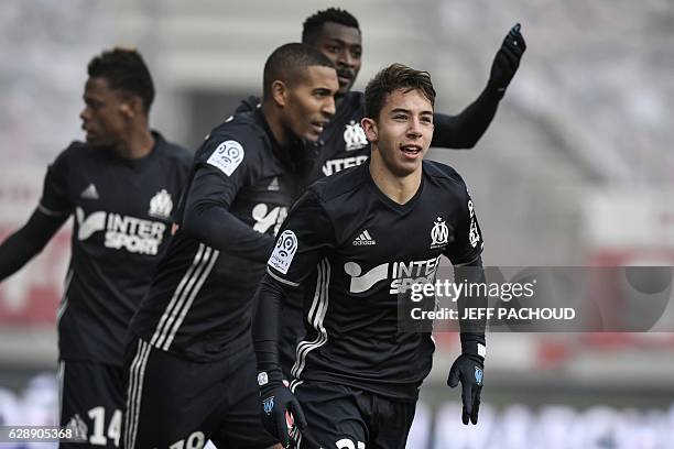 Olympique de Marseille's French midfielder Maxime Lopez celebrates after scoring a goal during the French L1 football match Dijon vs Marseille on...