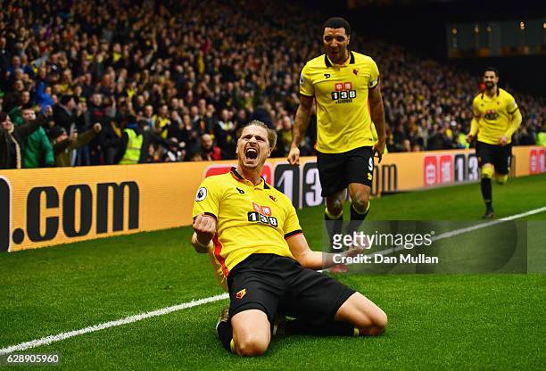 Sebastian Prodl of Watford celebrates with Troy Deeney as he scores their second goal during the Premier League match between Watford and Everton at...