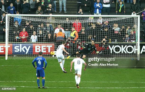 Dean Bowditch of MK Dons scores his sides first goall from the penalty spot during the Sky Bet League One match between Milton Keynes Dons and AFC...