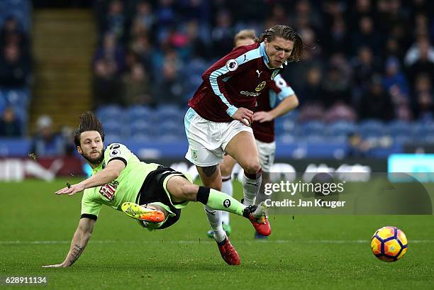 Harry Arter of AFC Bournemouth tackles Jeff Hendrick of Burnley during the Premier League match between Burnley and AFC Bournemouth at Turf Moor on...