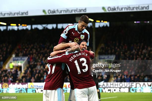 Jeff Hendrick of Burnley celebrates scoring his sides first goal with his Burnley team mates during the Premier League match between Burnley and AFC...