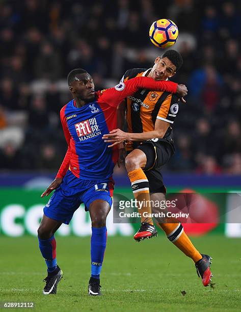 Christian Benteke of Crystal Palace and Curtis Davies of Hull City battle for the ball during the Premier League match between Hull City and Crystal...