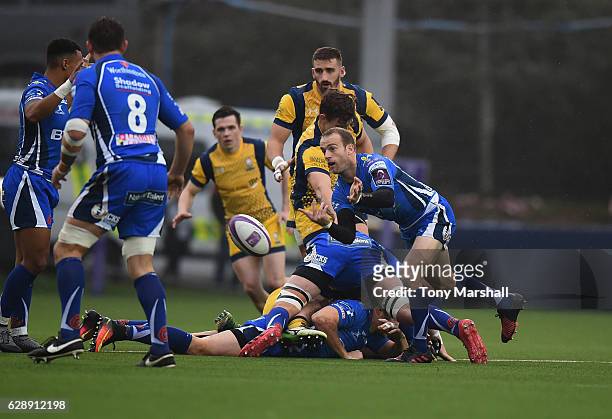 Sarel Pretorius of Newport Gwent Dragons passes out the ball during the European Rugby Challenge Cup match between Worcester Warriors and Newport...