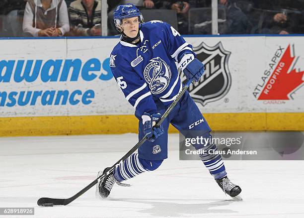 Vili Saarijarvi of the Mississauga Steelheads fires a pass against the London Knights during an OHL game at Budweiser Gardens on December 9, 2016 in...