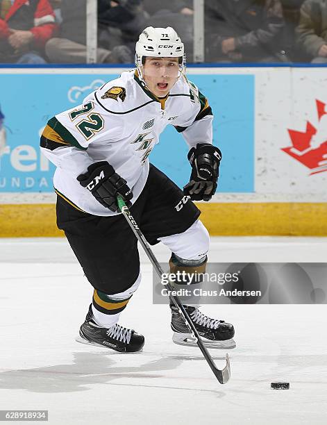 Janne Kuokkanen of the London Knights skates with the puck against the Mississauga Steelheads during an OHL game at Budweiser Gardens on December 9,...