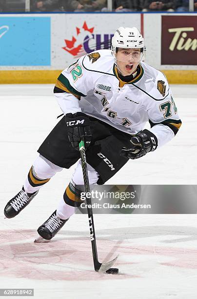 Janne Kuokkanen of the London Knights skates with the puck against the Mississauga Steelheads during an OHL game at Budweiser Gardens on December 9,...