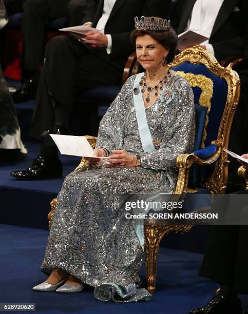 Queen Silvia of Sweden attends the awarding ceremony of the Nobel Prizes in medicine, economics, physics and chemistry on December 10, 2016 in...