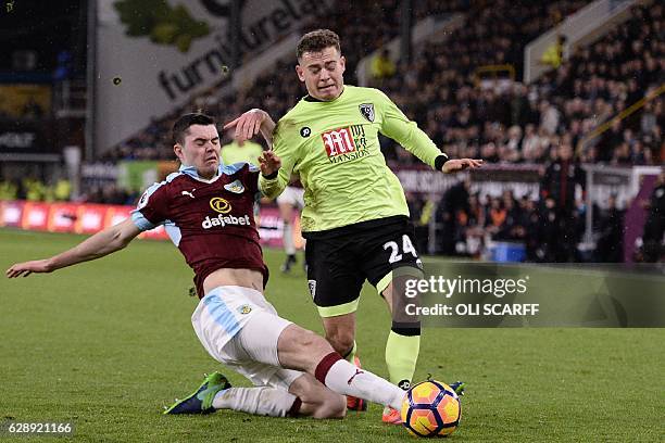 Burnley's English defender Michael Keane tackles Bournemouth's Scottish midfielder Ryan Fraser during the English Premier League football match...