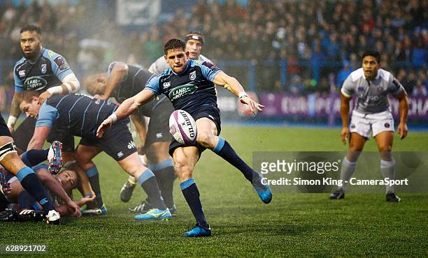 Cardiff Blues' Lloyd Williams gets the ball away during the Rugby Challenge Cup Pool 4 match between Cardiff Blues and Bath at Cardiff Arms Park on...