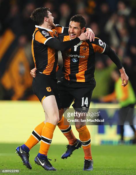 Jake Livermore of Hull City celebrates with Andrew Robertson as he scores their third goal goal during the Premier League match between Hull City and...