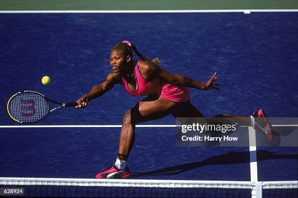 Serena Williams moves to return the in a match against Adriana Gersi during the Tennis Masters Series at the Indian Wells Garden in Indian Wells,...