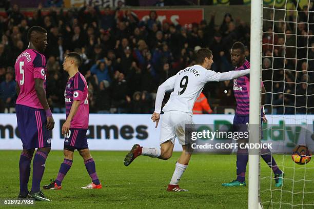 Swansea City's Spanish striker Fernando Llorente celebrates after scoring their third goal during the English Premier League football match between...