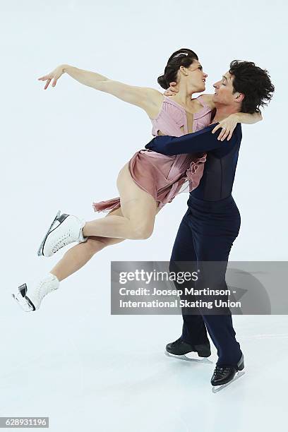 Tessa Virtue and Scott Moir of Canada compete during Senior Ice Dance Free Dance on day three of the ISU Junior and Senior Grand Prix of Figure...