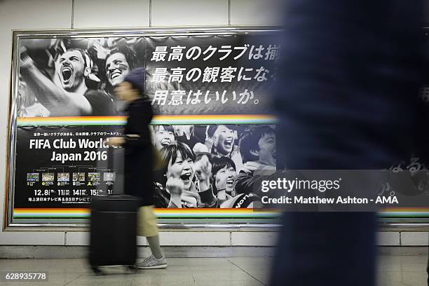 Club World Cup signage in Shibuya metro station in Tokyo ahead of the FIFA Club World Cup Play-off for Quarter Final match between Kashima Antlers...