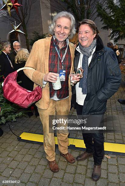 Thomas Gottschalk and Georg Dingler, Radio Gong Muenchen, attend the 21th BMW advent charity concert at Jesuitenkirche St. Michael on December 10,...