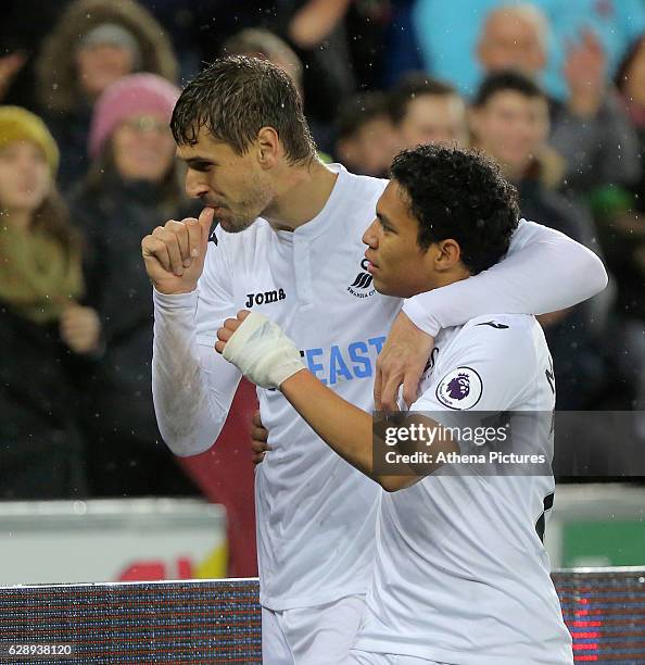 Fernando Llorente of Swansea City celebrates his second goal with Jefferson Montero during the Premier League match between Swansea City and...