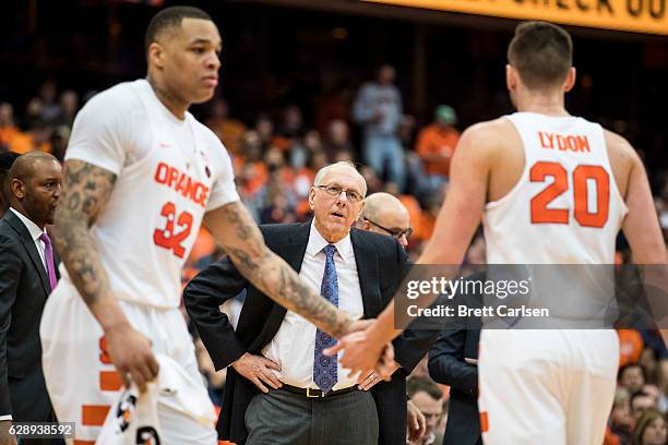 Head coach Jim Boeheim of the Syracuse Orange speaks with Tyler Lydon during the first half against the Boston University Terriers on December 10,...